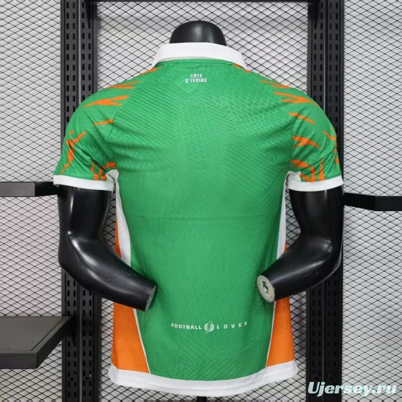 Player Version 2025 Ivory Coast Green with Elephant Graphic and Orange Trim Jersey