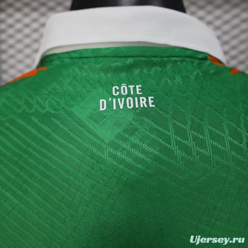 Player Version 2025 Ivory Coast Green with Elephant Graphic and Orange Trim Jersey