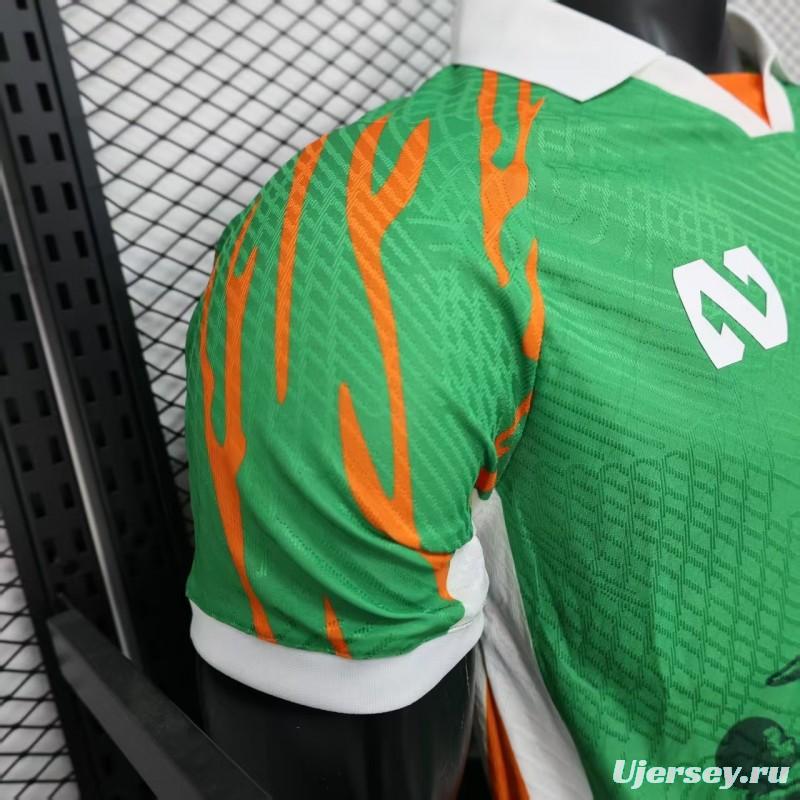 Player Version 2025 Ivory Coast Green with Elephant Graphic and Orange Trim Jersey