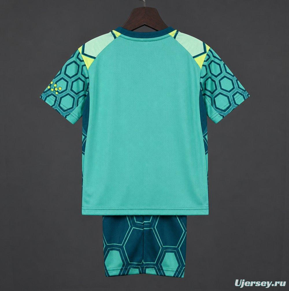 26/27 Kids Manchester City Vibrant Green Goalkeeper Jersey With Dark Blue Geometric Pattern.